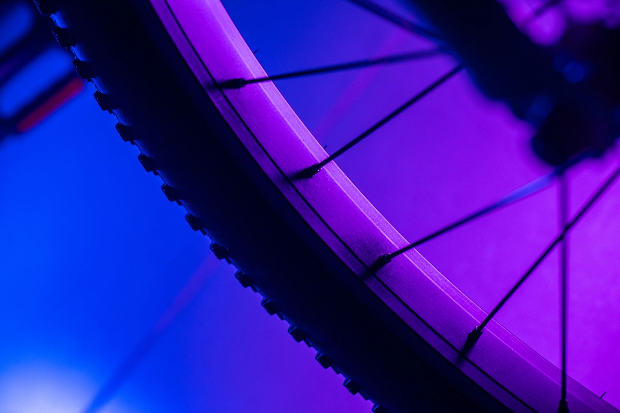 Electric bike wheel detail with blue lighting